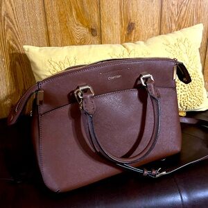 Calvin Klein handbag… lightly used. Brown in color.